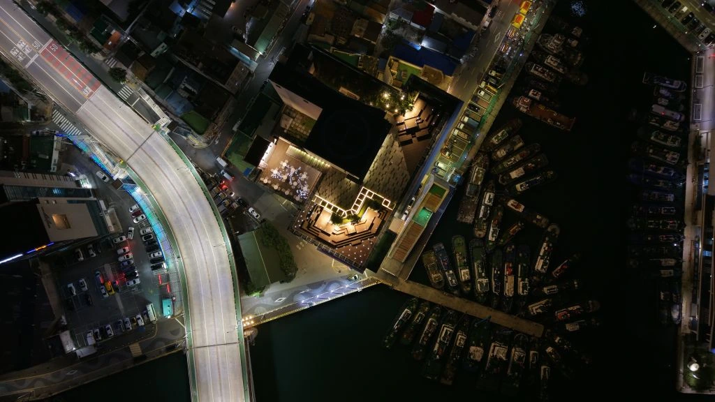 The Channel building at 487 Seaport Boulevard, with the harbor boardwalk in the foreground